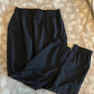 Black Fablectics athletic joggers.